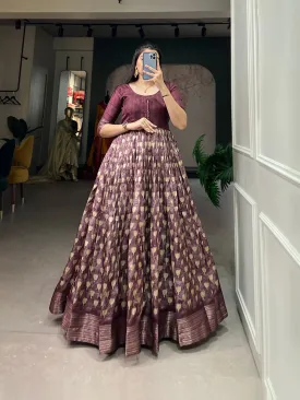 Wine Color Enthralling Dola Silk Gown with Printed Design and Luxe Zari Border